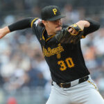 Paul Skenes throws a pitch.